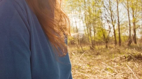 Young woman practicing yoga in a spring forest. Video stock 80602360