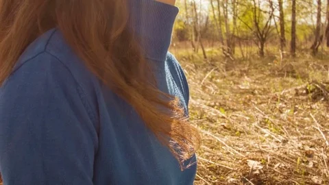 Young woman practicing yoga in a spring forest. Video stock 80605804