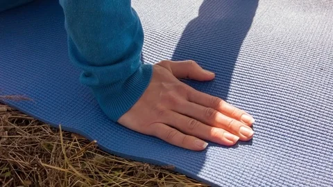Young woman practicing yoga in a spring forest. Stock Footage 80610380