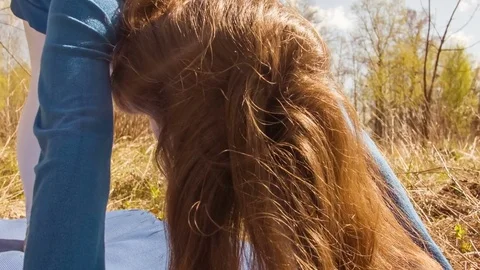 Young woman practicing yoga in a spring forest. Stockbeeldmateriaal 80617938