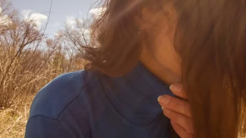 Young woman practicing yoga in a spring forest. Video stock 80621287
