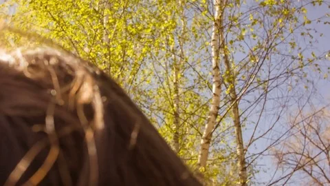 Young woman practicing yoga in a spring forest. Stockbeeldmateriaal 80621455