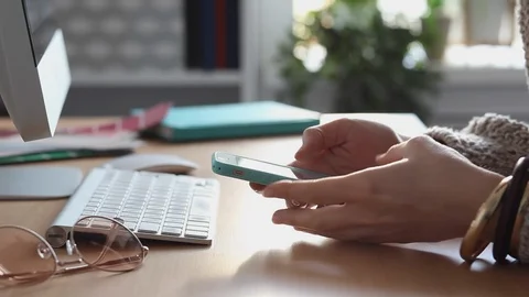 Young Woman Procrastinates Scrolling her Smartphone Stock Footage 106749261