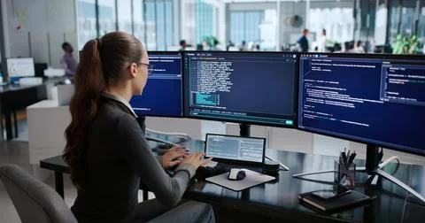 Young Woman Programmer Works On Cloud Coding Platform From Home Desk. 写真素材