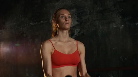 Young woman pumping biceps. Video stock 90280341