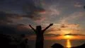 Young Woman Raising Hands at Sunset. Slow Motion. HD Footage