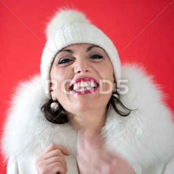 Young woman with red background Stock Photos