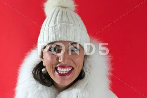Young woman with red background Stock Photos