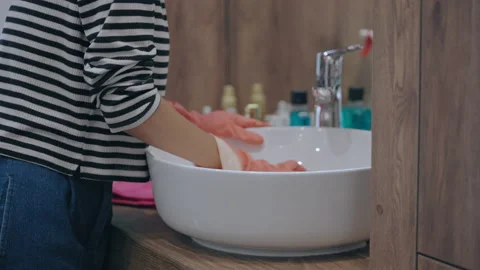 https://images.pond5.com/young-woman-rubber-gloves-cleaning-footage-161489223_iconl.jpeg