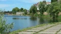 Young woman running near lake HD Footage