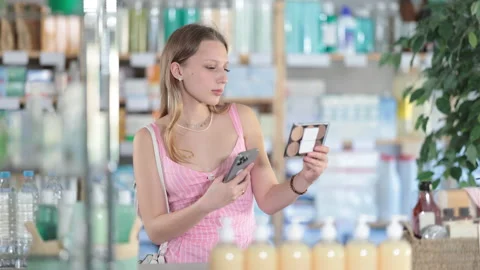 Young woman scanning qr code of feminine pads Stock Footage 325034513