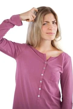 Young woman scratching head Stock Photos