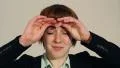 Young woman with serious headache or migraine HD Footage