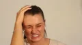 Young woman with serious headache or migraine HD Footage