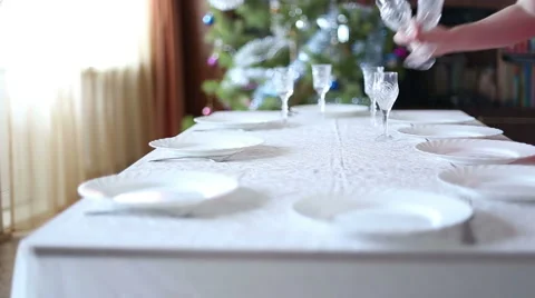 Young woman serves a festive table Stock Footage 45847519