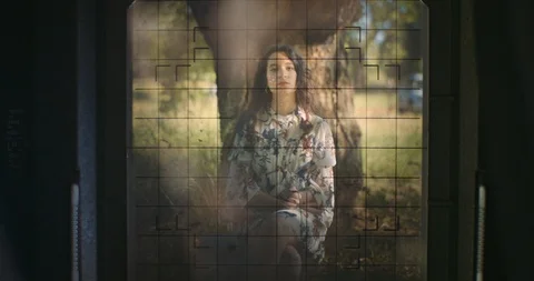 Young woman setting up large format camera in nature Stock Footage 117582332