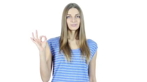 Young Woman Showing Ok Sign, White Background Stock Footage