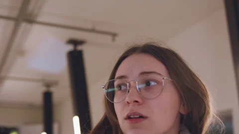 Young woman shows startled expression. Closeup of startled woman with glasses Stock Footage 341769755