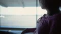 Young woman sitting in airport terminal, waiting for flight, meeting relatives HD Footage