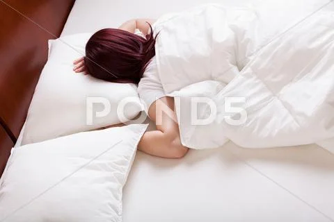Young woman sleeping Stock Photos