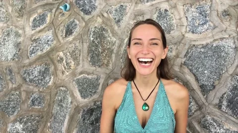 Young woman smiles, saying I love you: slo mo Stock Footage