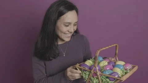 Young Woman Smiling With Wicker Easter Basket Stock Footage 227752163