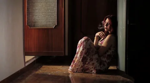 Young woman smokes a joint and cries to forget her problems - addict - drug - Stock Footage