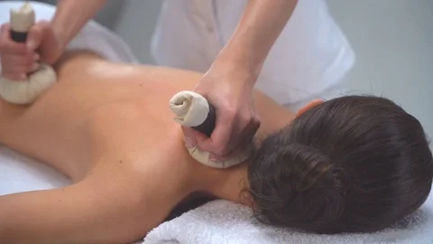 Young woman in spa. Traditional healing therapy and massaging treatments. Health Stock Footage