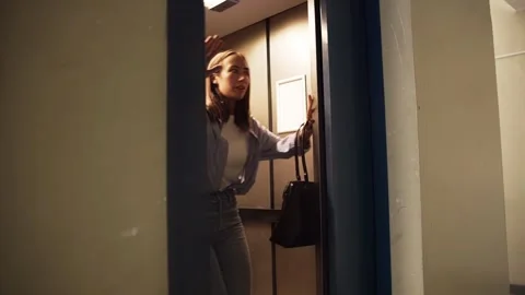 Young Woman Standing Inside Elevator Trying Stock Footage 313360560