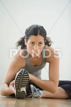 Young woman stretching Stock Photos