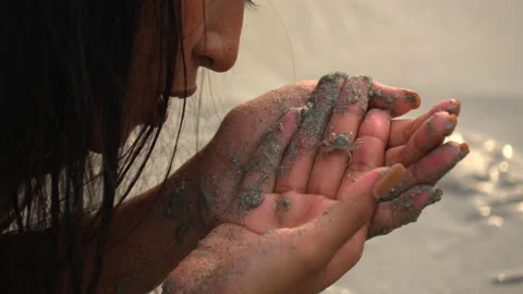 Young Woman Studying Tiny Crab In Sand On Beach Stock Footage 199134450