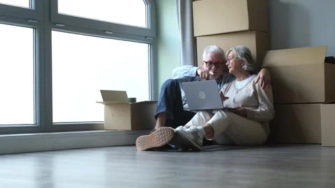 Young Woman Suffering from a Headache While Working on Her Laptop at Home Stock Footage 332684768