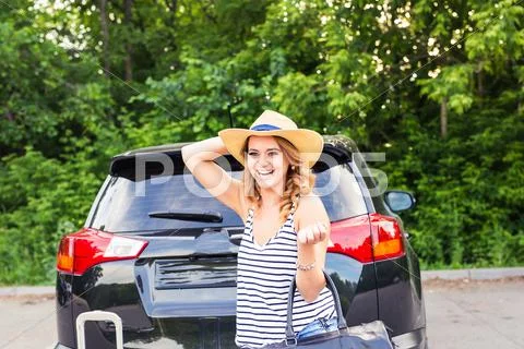 Young Woman With Suitcases. Vacation Concept. Car Trip. Summer Travel