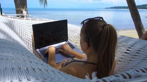 Young Woman Swinging in Hammock with Laptop. Remote Work Concept Stock Footage