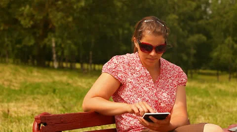 Young woman with tablet computer. smiling and laughing. Stock Footage 24759442