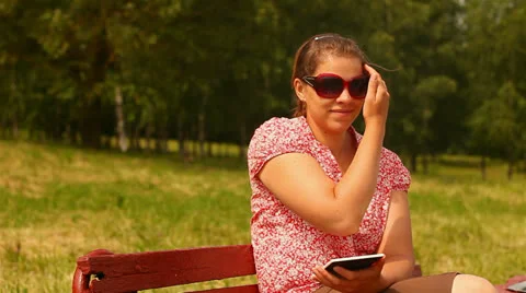 Young woman with tablet computer. smiling and laughing. Stock Footage 24759446