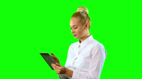 Young Woman with Tablet. Using Camera for Chat. Green screen. Middle Stock Footage 68146585