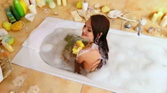 https://images.pond5.com/young-woman-take-bubble-bath-footage-056468333_iconm.jpeg