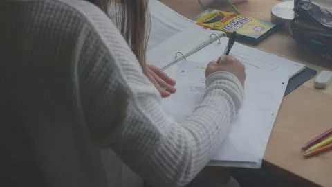 Young Woman Taking Notes Doing Homework | Stock Video | Pond5