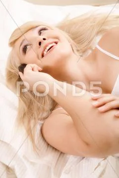 Young woman talking on phone Stock Photos