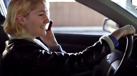 A Young Woman Talking on Phone While Driving Profile View Stock Footage 46016117