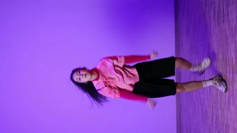 Young Woman, Teenager Dancing, Neon Light. Girl Shows Dance Moves Stock Footage 146527464