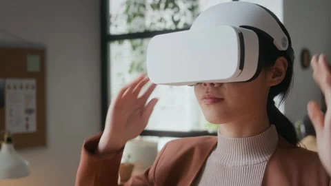 Young Woman Testing Virtual Reality Software in Office Stock Footage 306218842