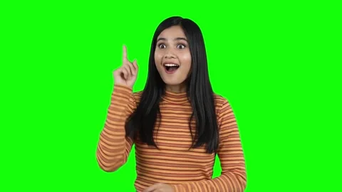 Young Woman Thinking and Finding an Idea on Green Screen Stock Footage 337940707