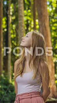 Young woman traveler discovering Ubud forest in Monkey forest, Bali Indonesia Stock Photos