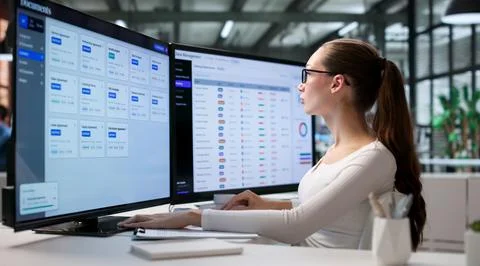 Young Woman Uses Computer Software To Organize Important Digital Files Effici Stock Photos