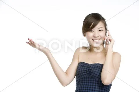 Young woman using cellphone Stock Photos