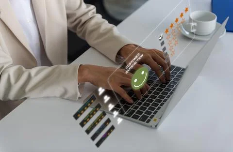 Young woman using computer ,customer service and five stars satisfaction rati Stock Photos