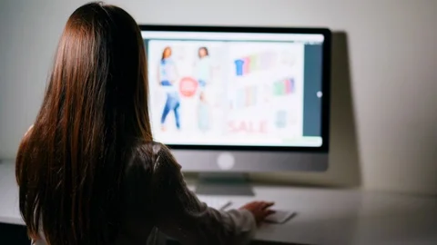 Young woman using computer for online purchase. Online shop. Stock Footage 96271404