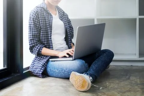 Young woman using computer. Stock Photos